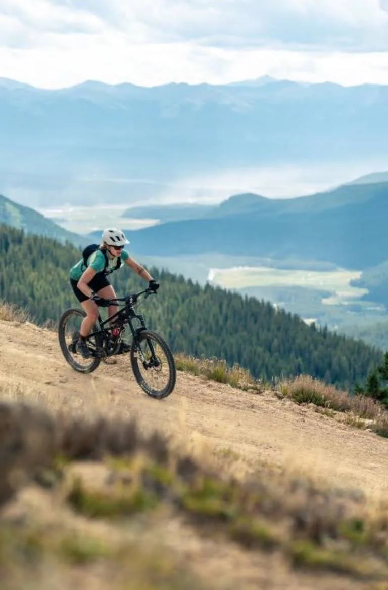 Mountain biking above a valley